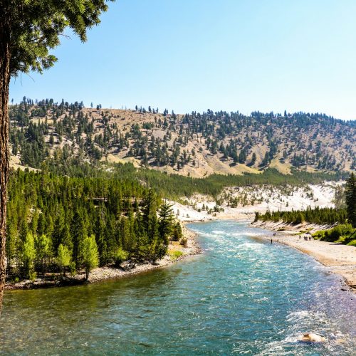 turquoise river flowing through rocky canyon wilderness landscape