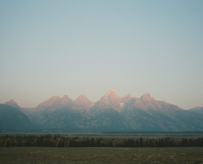 distant mountain range covered in misty morning light