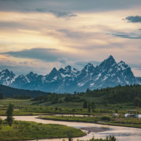 grand teton peaks rising above scenic valley landscape
