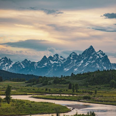 scenic grand teton mountain range with winding river valley